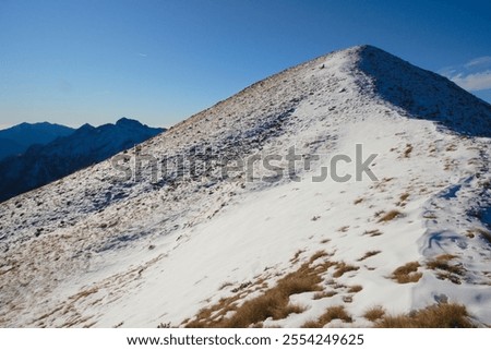 First snow on mount Cima di Lemma, Orobie, Italy
