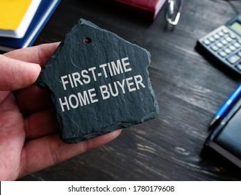 First Time Home Buyer Words On The Stone House Symbol.