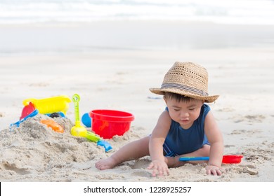 First Year Old Boy Play With Sand, Taking Baby To The Beach Concept