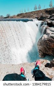 First-person View, Perspective To Sneakers And Waterfall. POV. Blogger Reportage