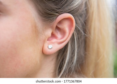 Firsts Ear Piercing On Young Female Girl