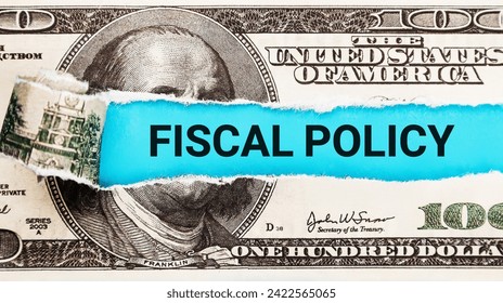 Fiscal Policy. The word Fiscal Policy in the background of the US dollar. Government Fiscal Policy Concept. Financial Regulation, Taxation, and Budget Control in Economy Management.