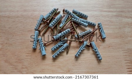 Fischers screw set. Bolts and fischers before inserting into the wall