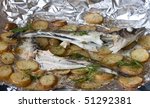 	fish baked with potato