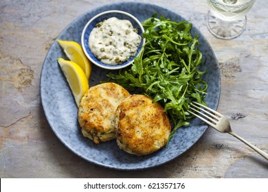 Fish Cakes With Tartare Sauce And Rocket Salad