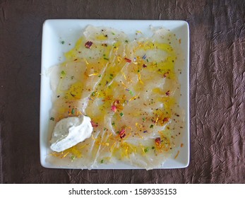 Fish Carpaccio (or Tartare) Served On A Square Board, Creole Restaurant, French West Indies, France 