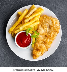 fish and chips french fries deep fried fast food takeaway healthy meal food snack on the table copy space food background rustic top view - Powered by Shutterstock