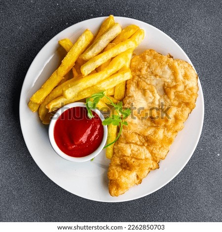 fish and chips french fries deep fried fast food takeaway healthy meal food snack on the table copy space food background rustic top view Foto stock © 