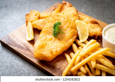 fish and chips with french fries - unhealthy food - Shutterstock ID 1254242821