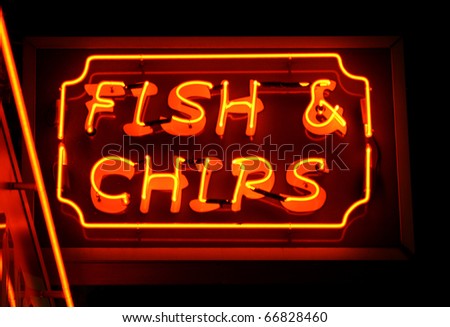 fish and chips neon sign at night