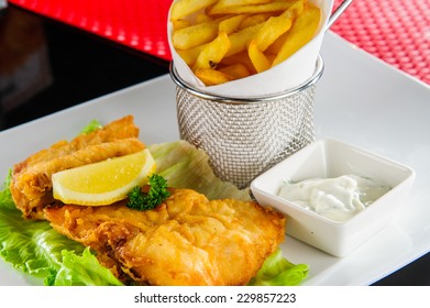 Fish And Chips On Basket.