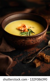 Fish Cream Soup With Salmon, Cheese, Potatoes And Herbs In Brown Ceramic Soup Bowl. Dark Food Photography