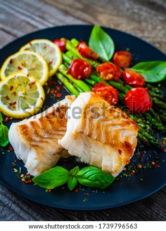 Similar – Image, Stock Photo fried cod fillet with berries.