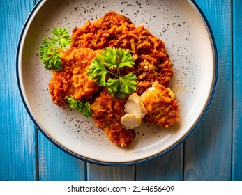 Fish Dish - Fried Fish Fillet In Vegetable Sauce On Wooden Table 