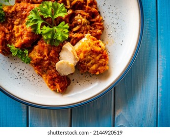 Fish Dish - Fried Fish Fillet In Vegetable Sauce On Wooden Table 