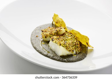 Fish Dish Salt Cod Crusted With Pistachios And Black Polenta