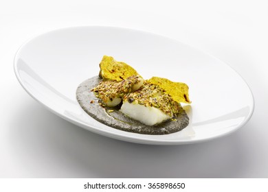 Fish Dish Salt Cod Crusted With Pistachios And Black Polenta