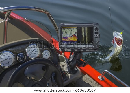 Fish finder. Fishing sonar (echolot) at the boat