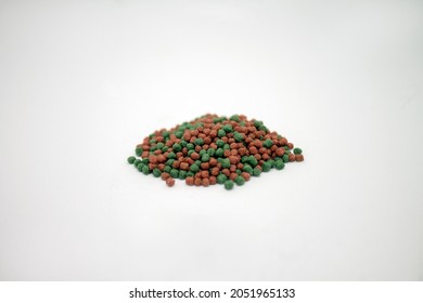 Fish Food Closeup Image. Fish Food In Pellet Form.