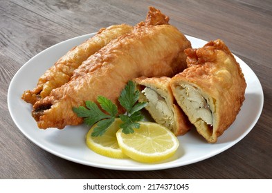 Fish Fried In Batter On A Plate