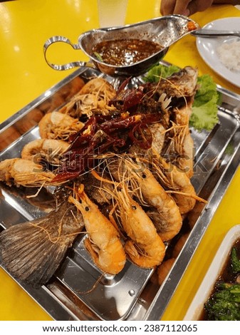 Fish fried with grilled chilli