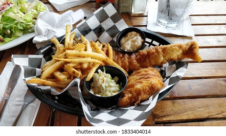 Fish 'n Chips With Fries And Coleslaw In A Basket