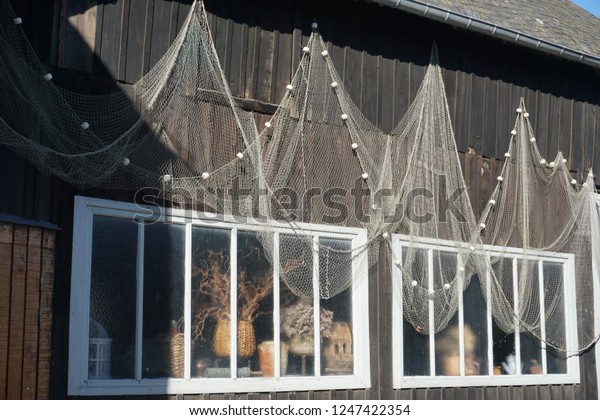 Fish Nets Hanging On Wooden Side Stock Photo Edit Now 1247422354