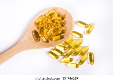 Fish Oil Capsules In A Spoon