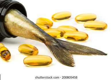 Fish Oil Capsules And Fish Tail In Brown Jar