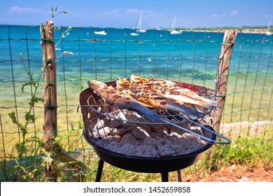 Fish On The Grill By The Mediterranean Beach, Idyllic Vacation Food Preparing, Istria Region Of Croatia