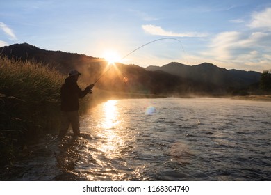 Fish On While Fly Fishing The Snake River In Idaho