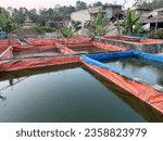A fish pond  is a controlled pond, small artificial lake or retention basin that is stocked with fish and is used in aquaculture for fish farming, for recreational fishing, or for ornamental purposes