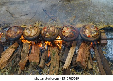 The fish pot is cooked manually by wood stove. Braised fish is a traditional dish every Tet in northern Vietnam!