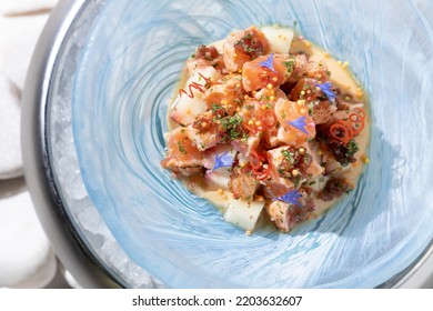 Fish Salad In A Blue Plate On A White Background