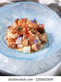 Fish Salad In A Blue Plate On A White Background