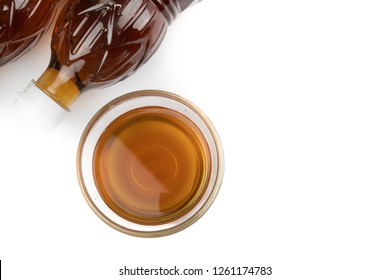 Fish Sauce In Plastic Bottle And Fish Sauce In Glass Bowl Isolated On White Background.