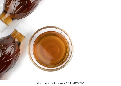 Fish Sauce In Plastic Bottle And Fish Sauce In Glass Bowl Isolated On White Background.