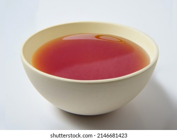 Fish Sauce In White Bowl Isolated On Background. Phu Quoc Traditional Fish Sauce.