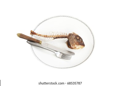 Fish Skeleton On The Plate - Symbol For Food Shortage