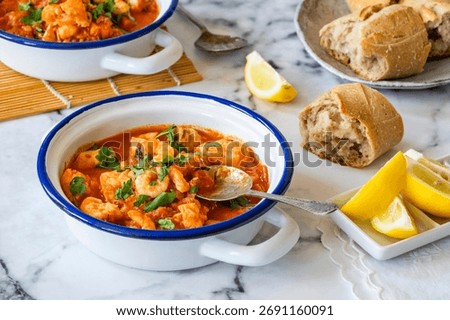 Fish stew made of cod, salmon, smoked haddock and prawns