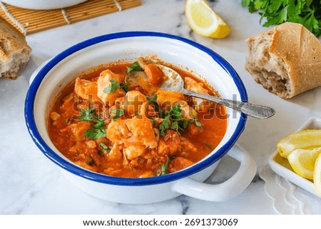 Fish stew made of cod, salmon, smoked haddock and prawns