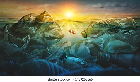 Fish Swims Among Plastic Bag Ocean Pollution. Environment Concept