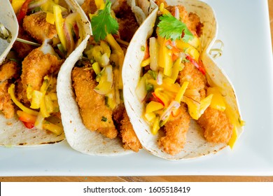 Fish Tacos. Tacos. Meat, Fried Fish, Avocado, Cilantro, Cheese, Homemade Salsa, Lettuce And Lime Slices. Tex-Mex Favorite, Mexican Street Tacos: Beef, Fish, Pork, Served On Homemade Corn Tortillas.