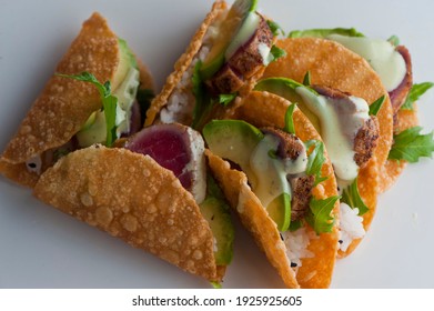 Fish Tacos. Tacos. Meat, Fried Fish, Avocado, Cilantro, Cheese, Homemade Salsa, Lettuce And Lime Slices. Tex-Mex Favorite, Mexican Street Tacos: Beef, Fish, Pork, Served On Homemade Corn Tortillas.