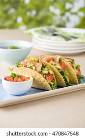 Fish Tacos Shell With Tomato, Beans, Capsicum And Avocado Salsa