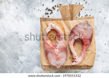 fish white pulp meat steak silver carp raw seafood healthy food ready to cook snack diet meal top view copy space background rustic top view