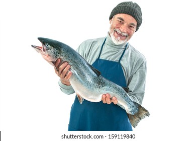 Fisher holding a big atlantic salmon fish isolated on white background