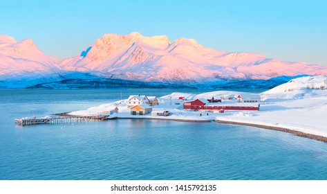 Fisher Shelter With Wooden Pier, Norwegian Fjords In The Background  - Tromso, Norway