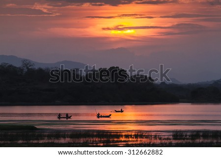 Fisherman in Arugam bay lagoon sunset, Sri Lanka