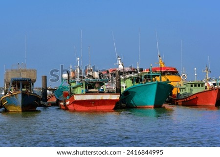 fisherman boat moored in port located at Pulau Duyung, , Terengganu, Malaysia.